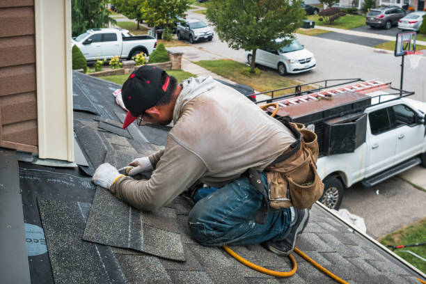 Professional Roof Replacement technician working in Brogan, OR